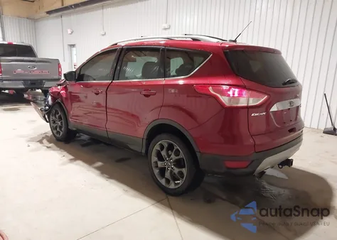 2015 Ford Escape Titanium z USA, uszkodzony, nr VIN 1FMCU9J9XFUB91359